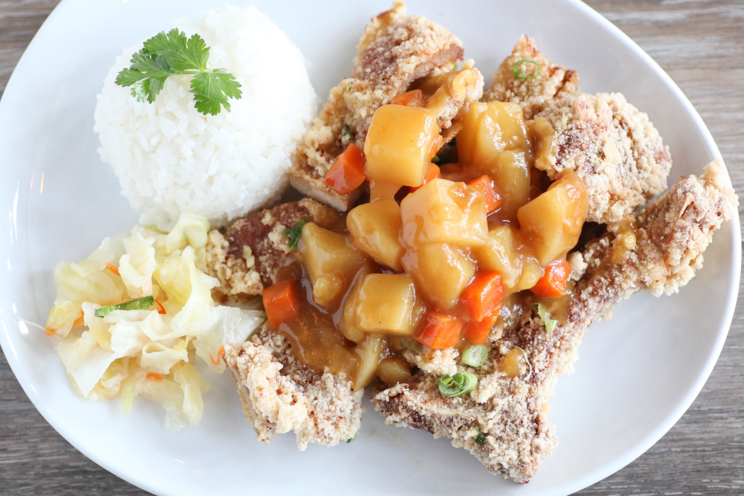 CURRY FRIED PORK CHOP W/RICE Coco's Cafe on Guadalupe